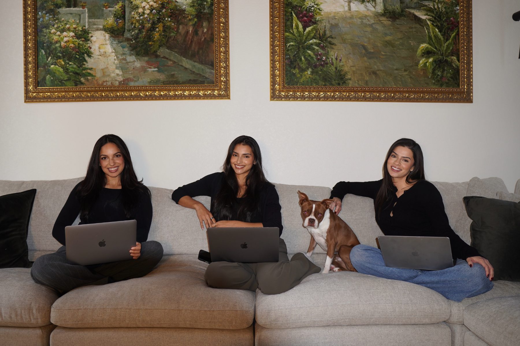 Amanda, Amber and Natalia of The Aligned Collective on a couch together